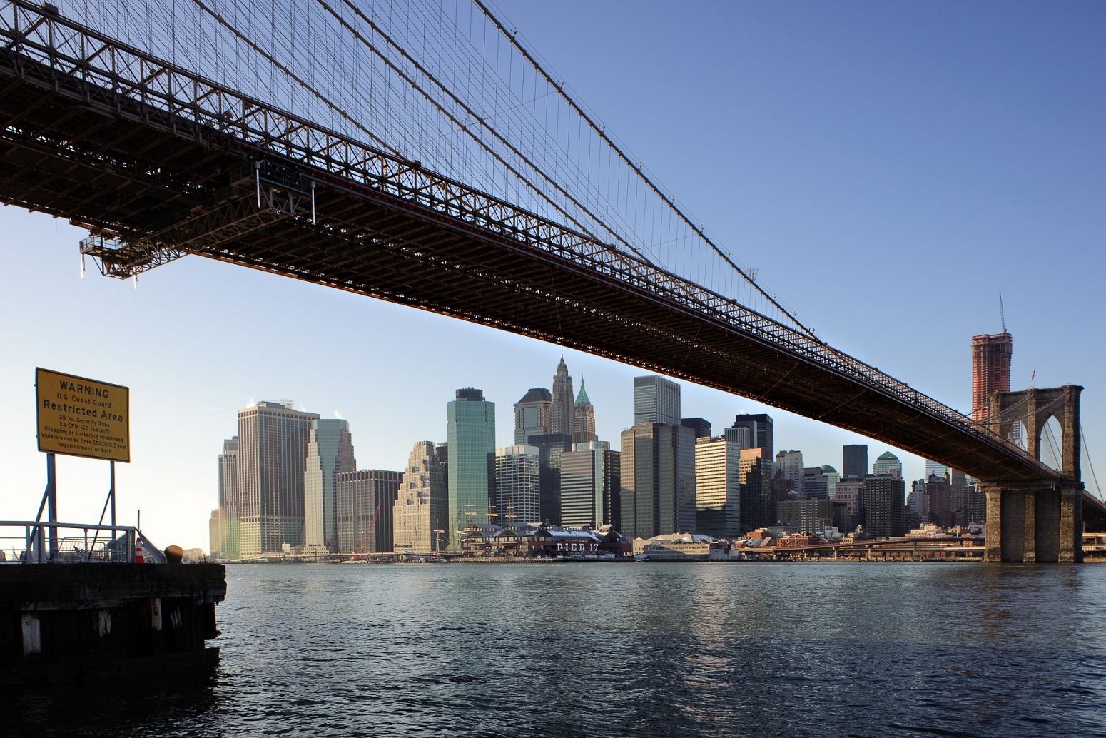 Manhattan and the Brooklyn Bridge from Empire Fulton Ferry, New York, USA